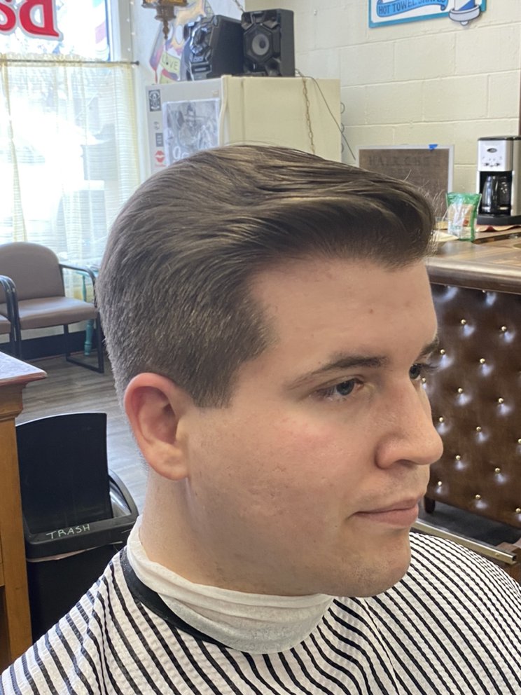 A man with a fresh haircut